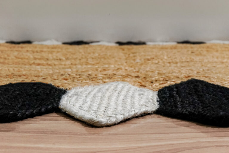 Hand-braided jute rug in a styled room