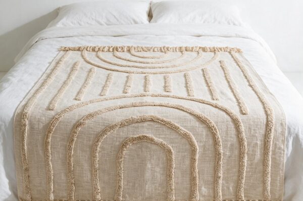 STCT-132 hand-tufted cotton throw styled in a hospitality interior
