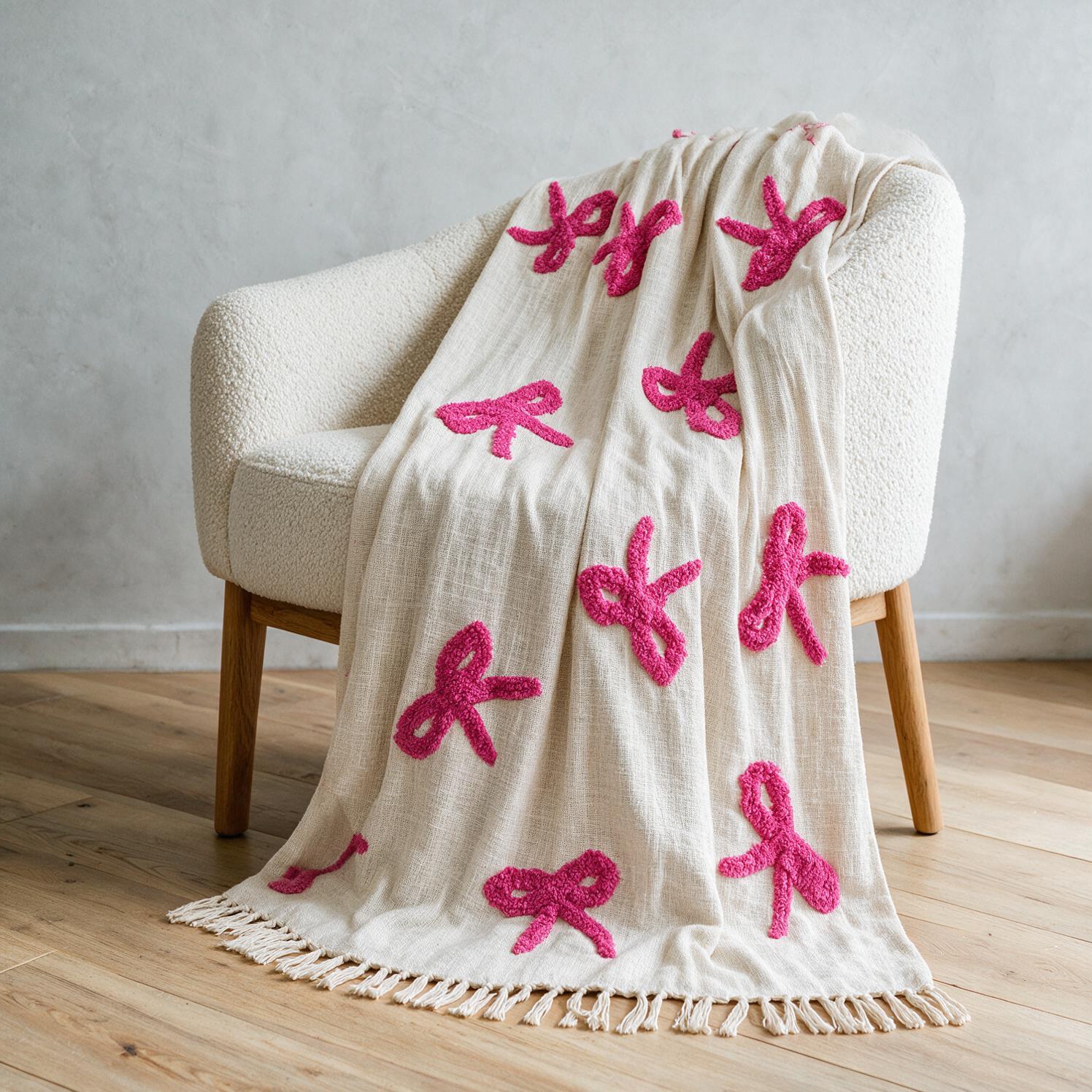 STCT-133 PK colour-block hand-tufted cotton throw styled in a spa-style room