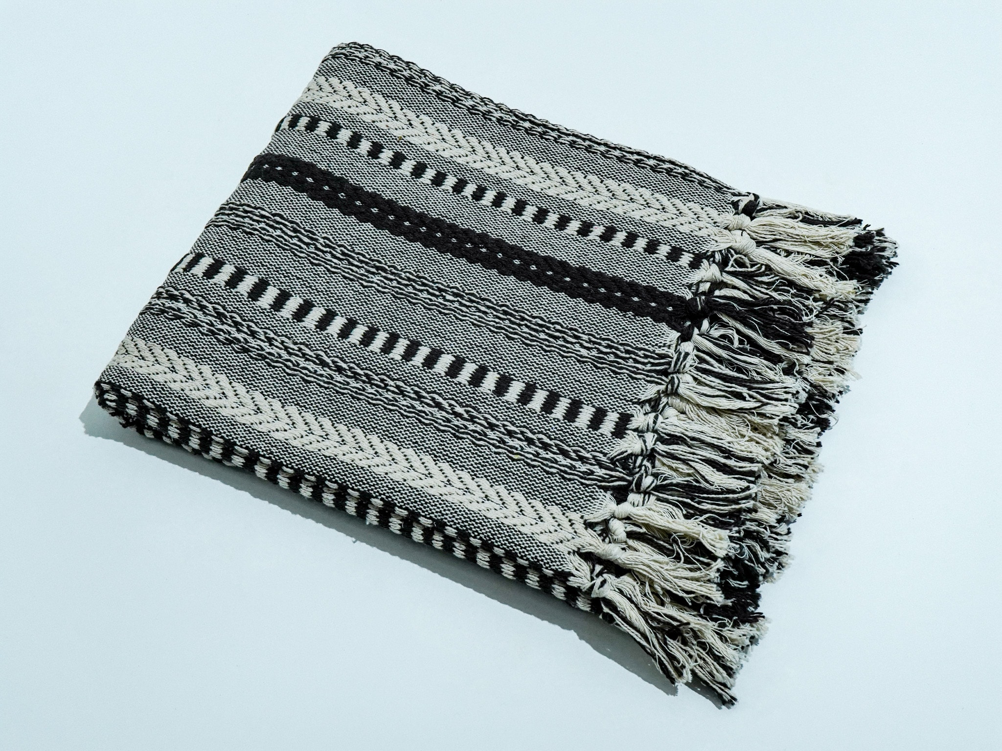 Rehan Throw, STCT-21, handwoven recycled cotton, styled in a room