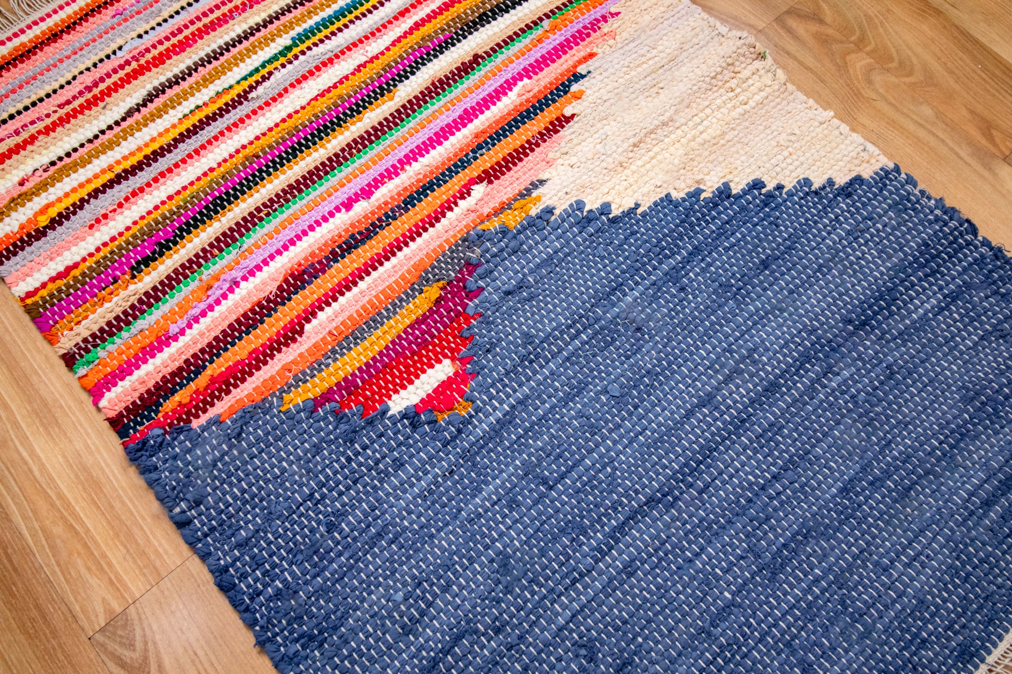 Close-up of the handwoven weave texture on the Prism Rug RU24-270