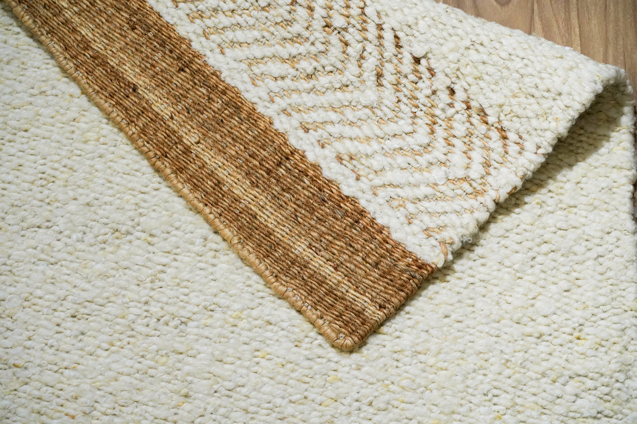Close-up of the handwoven weave on handcarded wool rug AWD2603 IV