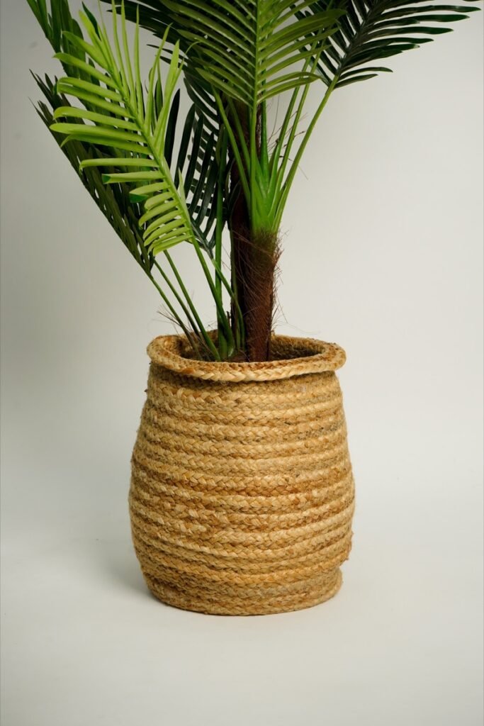 Handwoven basket styled in a room, made in India for wholesale