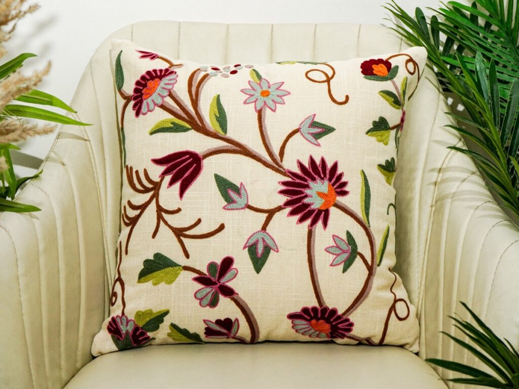 Handmade cushion styled on a sofa, made in India for wholesale