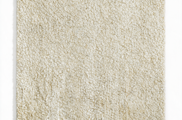 Boucle wool rug in natural beige (AWD2613 NBG), studio shot on white background showing looped pile texture