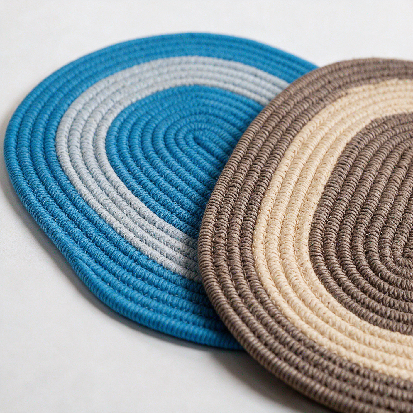 Lock-stitched seams joining braided coils on a finished rug
