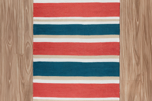 Coral Reef Stripe hand-tufted wool rug (APV-26006) shot on white studio background