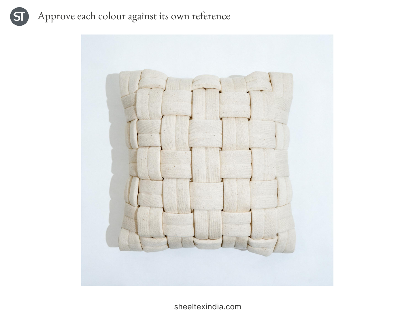 Ivory square cushion with broad interlaced fabric bands on a pale background.