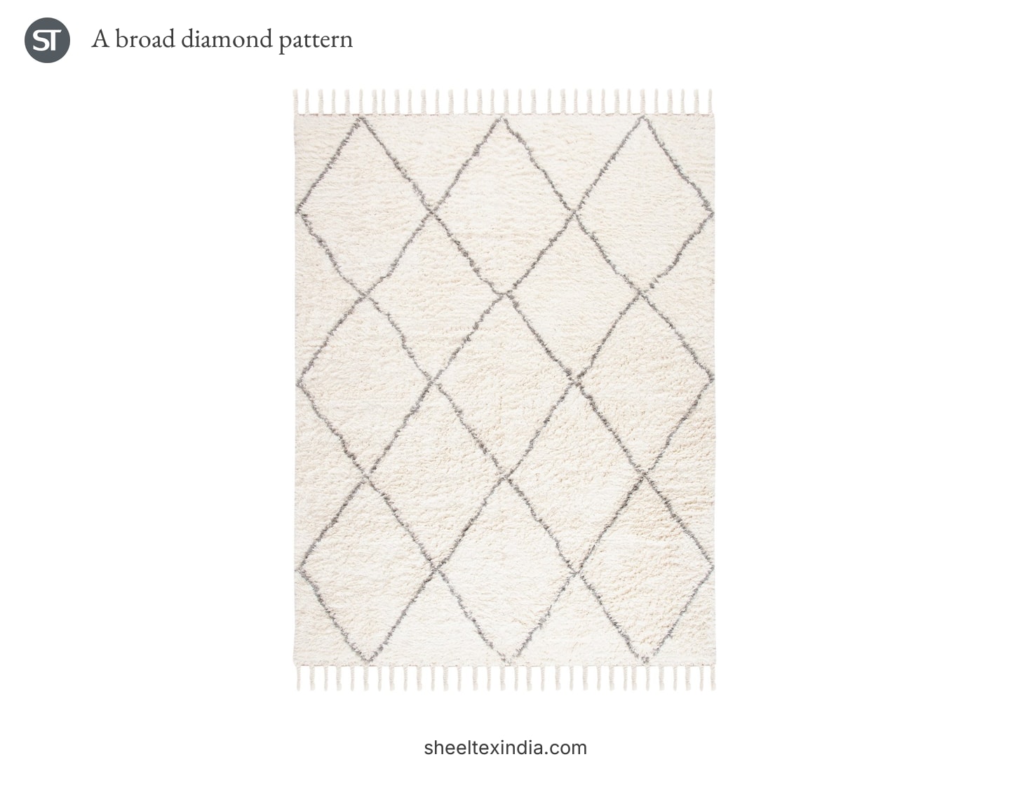 Cream rectangular rug with broad grey diamond lines and fringe along its short edges.